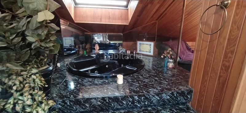 Foto f81f37a7-ab0c-4361-9722-ceab3dc8526c. Casa aparellada amb calefacció aparcament piscina a Santa Cruz de Bezana