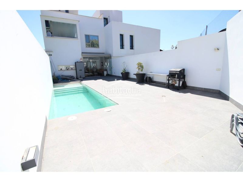 Foto cb75381b-5324-4e91-b25a-20002ed97654. Casa adossada amb calefacció aparcament piscina a Motril
