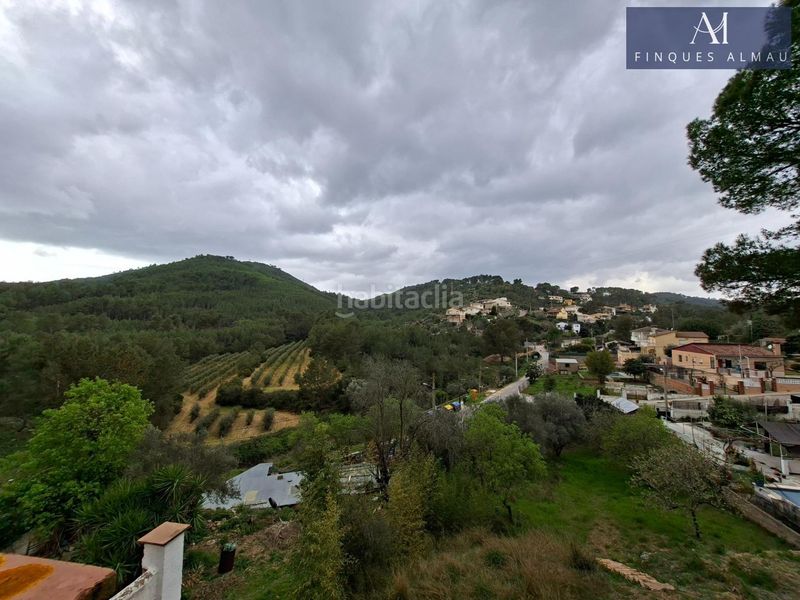 Foto 0a432404-9dc3-4a42-b45d-3c9cb00325cb. Casa aparellada amb aparcament a Olivella