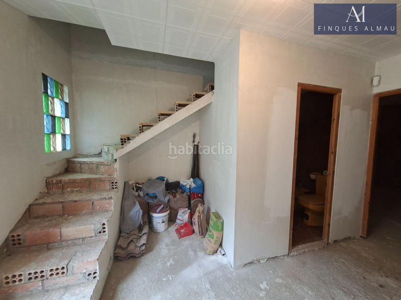 Foto 34d42752-d630-4c40-adce-711e71ff9c17. Casa aparellada amb aparcament a Olivella