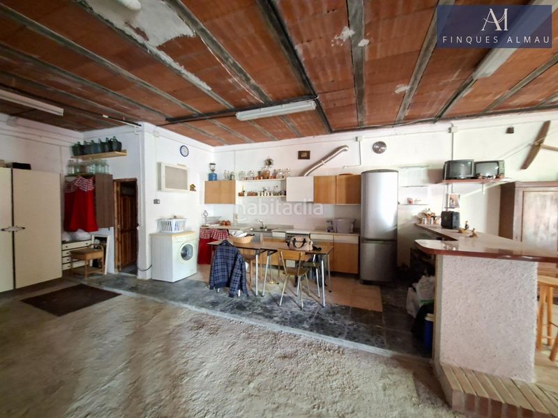Foto 3f8f271c-31fc-43a9-97c6-b641b81163ca. Casa aparellada amb aparcament a Olivella