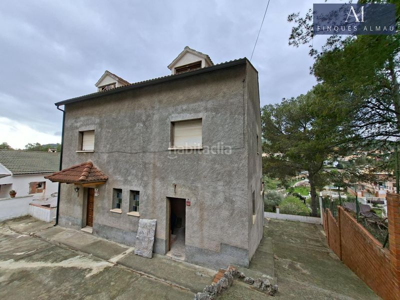 Foto 5ee01db7-2b0e-42b6-92b4-83e2be69e510. Casa aparellada amb aparcament a Olivella