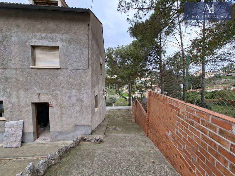 Foto 8e486346-a3da-4e0a-a26e-a3261aa89259. Casa aparellada amb aparcament a Olivella