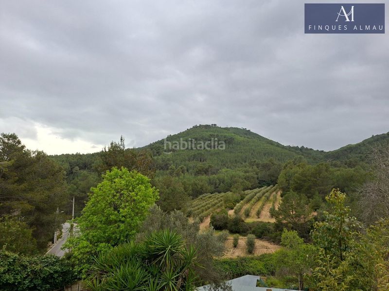 Foto cf10e0da-9218-4208-b2bb-33b02f3b3d14. Casa aparellada amb aparcament a Olivella