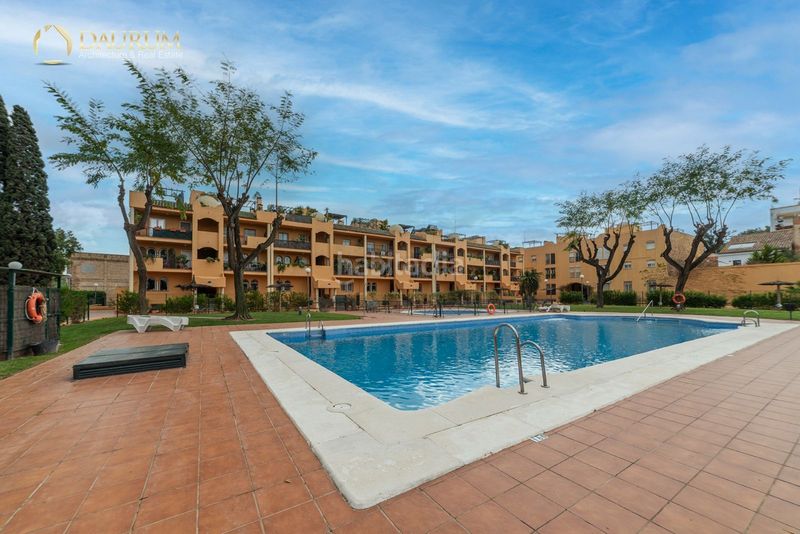 Foto f09c30f0-5a8c-4d2c-86c1-b2738af0ff5e. Dúplex amb calefacció aparcament piscina a Barrio Bajo San Juan de Aznalfarache