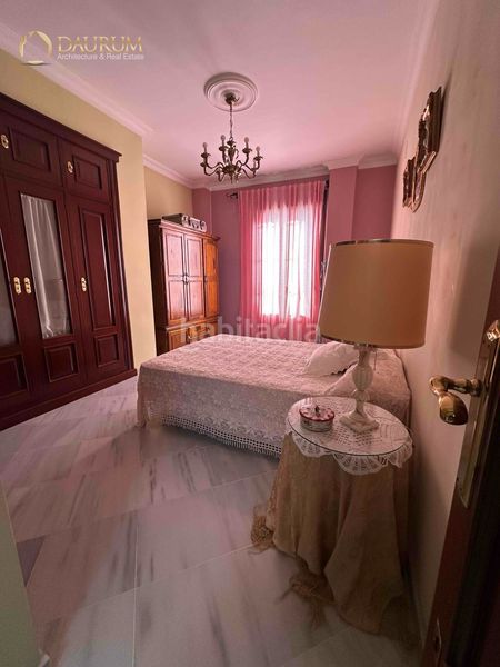 Foto 81280e95-ec3a-44e9-b8b2-f37f62d863b7. Casa amb calefacció aparcament a La Buhaira Sevilla