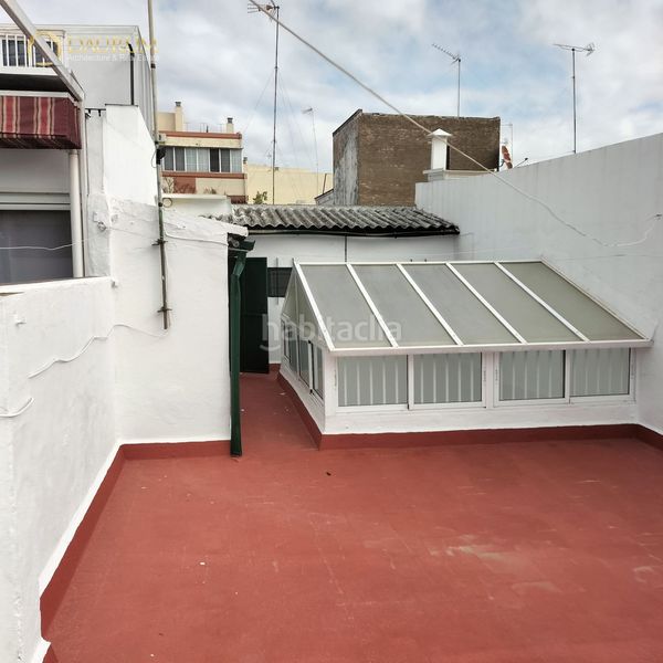 Foto 1c1cb25b-cc1c-4d0d-bcb5-7e27d2b69d31. Casa adossada amb piscina a Cruz Roja Sevilla