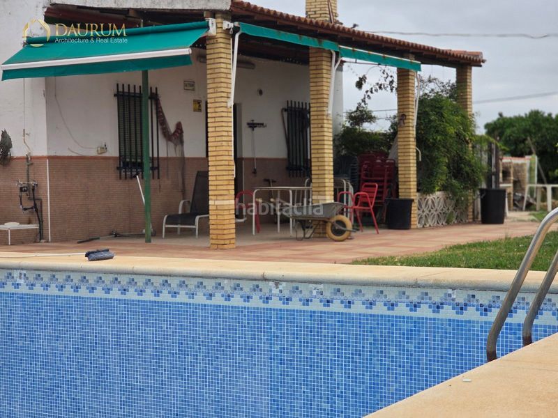 Foto d506bf85-2f4a-4dd6-b69a-8dae6614a1f4. Xalet amb calefacció aparcament piscina a Umbrete