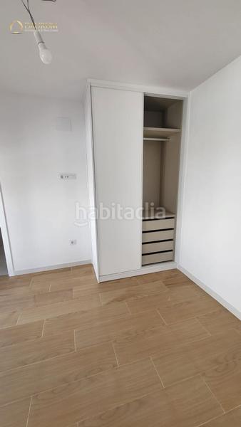 Foto 27aa5983-9043-4081-90e2-c065e36883c8. Casa adossada amb piscina a Centro Tomares