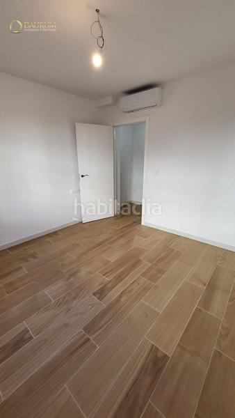 Foto 42b494bc-a27e-40cd-a824-df15d951deb4. Casa adossada amb piscina a Centro Tomares