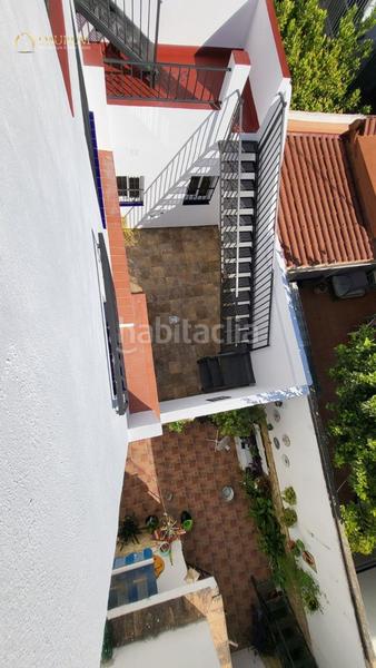 Foto 8bdc6f3e-eca4-433d-bcb3-e56d9b4db85f. Casa adossada amb piscina a Centro Tomares