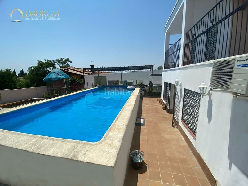 Foto 7c594106-d3c5-466e-8ab9-010c20d52e72. Casa amb aparcament piscina a Oromana Alcalá de Guadaira