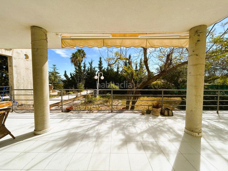 Foto 1d328938-6936-45c2-b641-83abd3a44802. Chalet avec parking dans Campoamor Orihuela