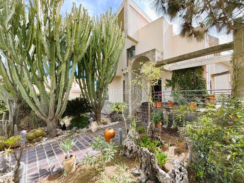 Foto f74ca2d4-f0bc-49d6-a8c5-f96defa5fefb. Chalet avec parking dans Campoamor Orihuela