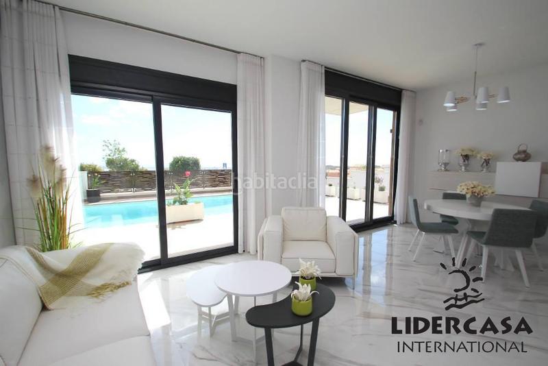 Foto fda3b68f-f54d-47e9-90bc-94b0a65bc1f0. House with parking pool in Campoamor Orihuela