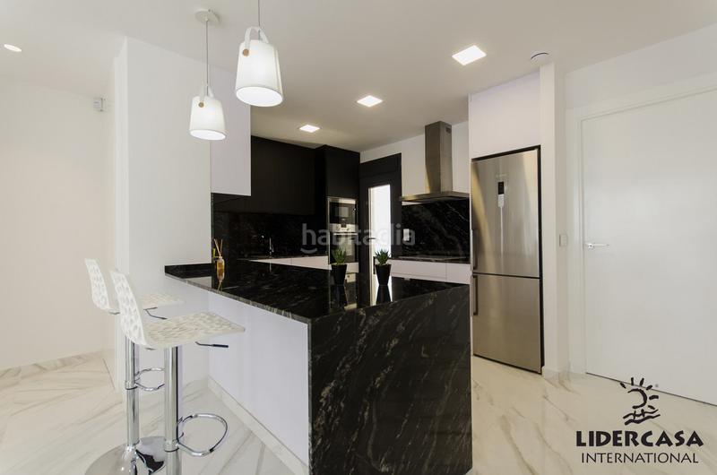 Foto 02a1ab7e-c35d-402c-9f52-b5c8962875db. Maison avec parking piscine dans Campoamor Orihuela