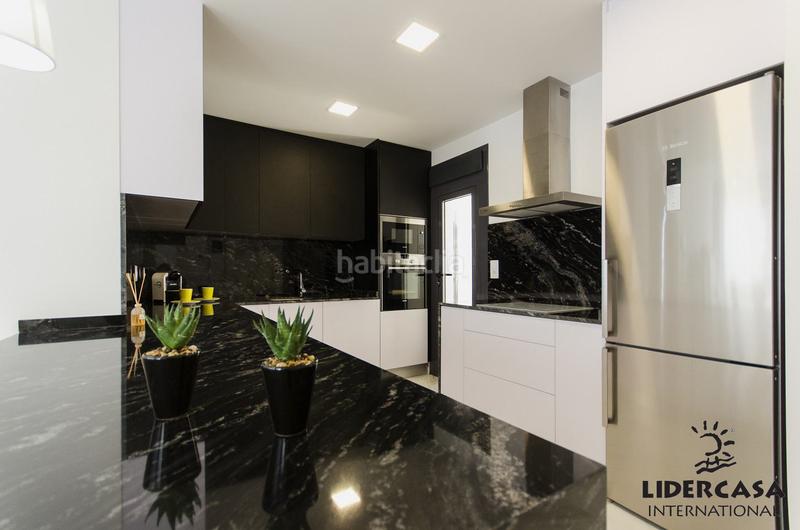 Foto 233ff528-e72b-41a7-9df9-cfdf05233d87. Maison avec parking piscine dans Campoamor Orihuela