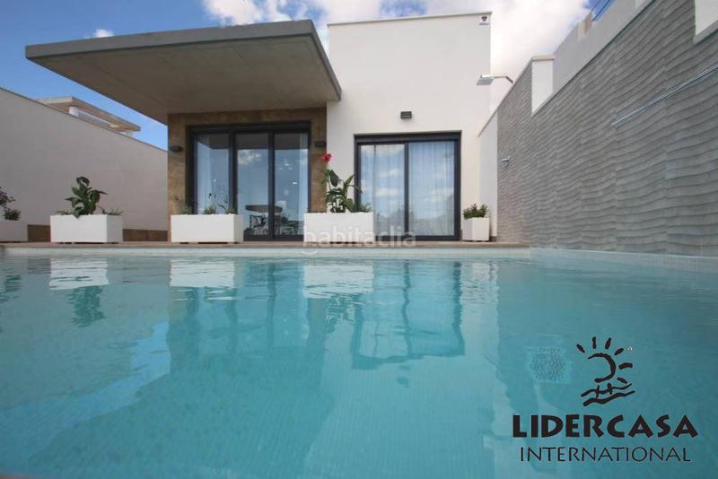 Foto d62f2b2d-fb8e-4da4-96a4-83d4642365ad. Maison avec parking piscine dans Campoamor Orihuela