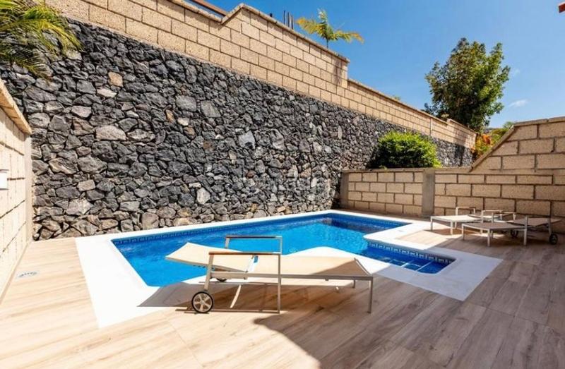 Foto 50cca159-dd25-41a2-af66-8c04621fbc52. Maison jumelée dans Playa Fañabé Alto Adeje