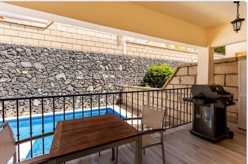 Foto b83c7f84-3de5-44fe-abb0-b6502cfa85a8. Semi detached house in Playa Fañabé Alto Adeje