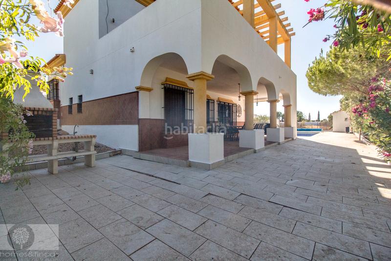 Foto ed3c6468-f2f0-42af-9eac-d16e480cd9cb. Xalet amb xemeneia aparcament piscina a Costa Esuri Ayamonte