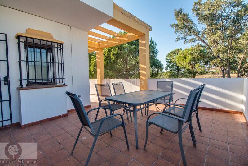 Foto f927df4b-2e25-4d56-bfdf-55b42f94cfa3. Xalet amb xemeneia aparcament piscina a Costa Esuri Ayamonte