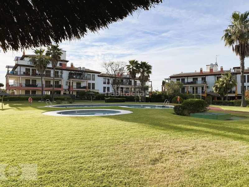 Foto c6cacad1-3a98-4a81-ab37-360ea79cf134. Pis amb aparcament piscina a Costa Esuri Ayamonte