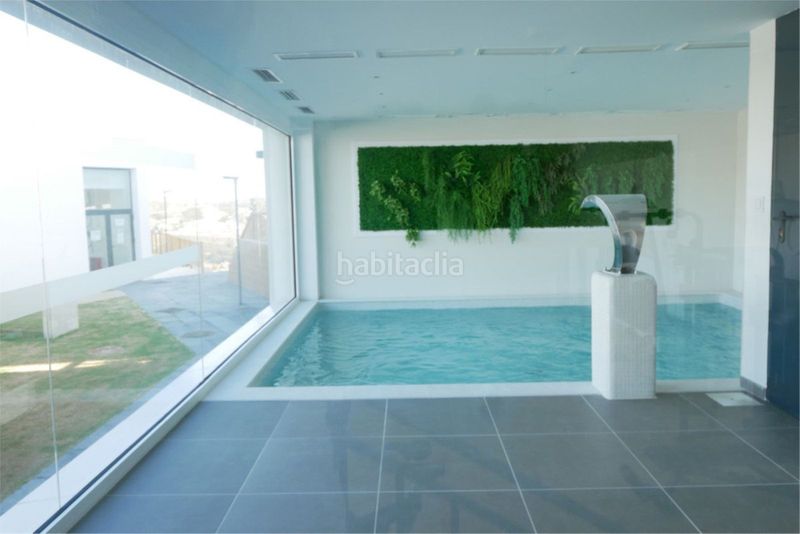 Foto c6be8b95-4cf2-4067-b3c7-7d084b996db3. Planta baixa amb aparcament piscina a la cala Mijas Mijas