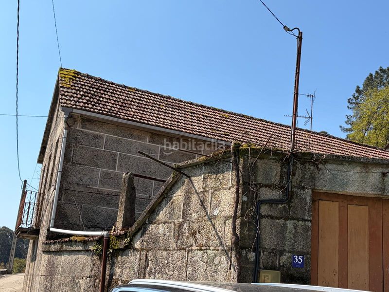 Foto adcfc4aa-b1a2-450b-bb04-28af296159e5. Casa aparellada a Covelo (O)