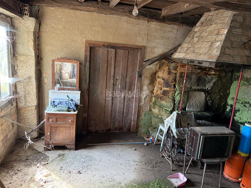 Foto edbbde84-e59a-4304-822f-4a6c4c9404b1. Casa aparellada a Covelo (O)