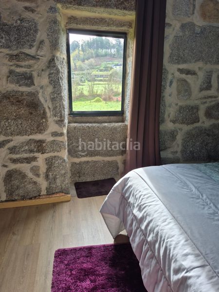 Foto fe764cce-dac5-458c-b431-86b9dc03a588. Xalet amb xemeneia calefacció piscina a Ponteareas