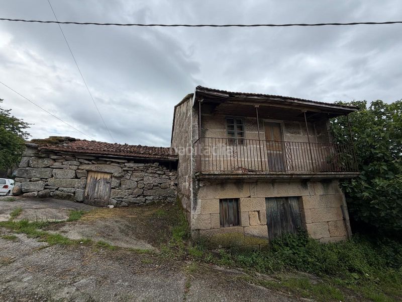 Foto dd61da45-0ea1-4c91-a4fc-5849b4d59d16. Casa aparellada a Maside