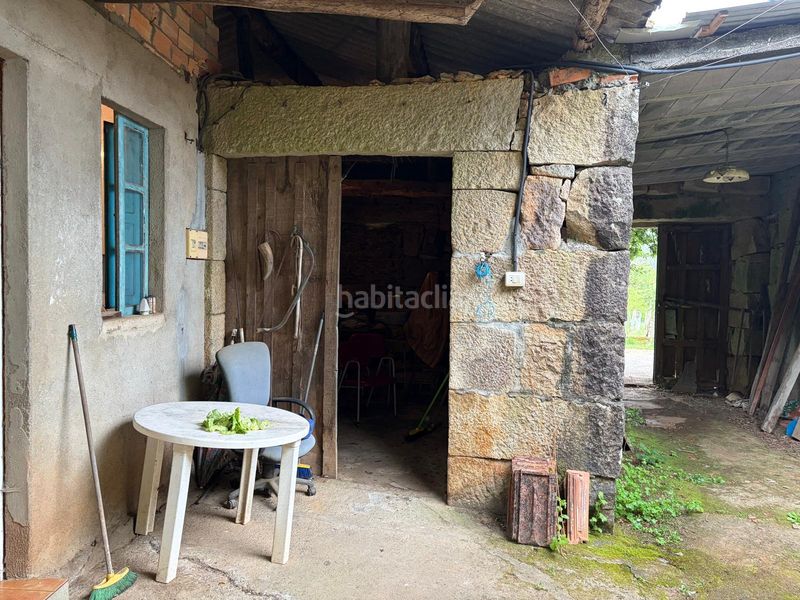 Foto 3a435991-086f-4788-91f8-a899444bfd50. Casa aparellada amb xemeneia a Cartelle