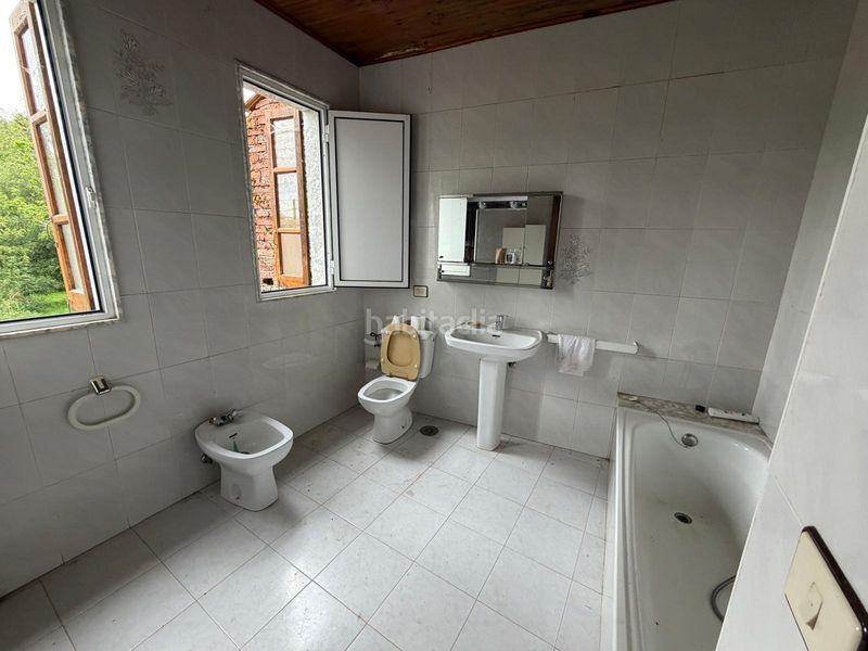 Foto 71d3ef6e-2986-4d79-88bf-45738301acc5. Casa aparellada amb xemeneia a Cartelle