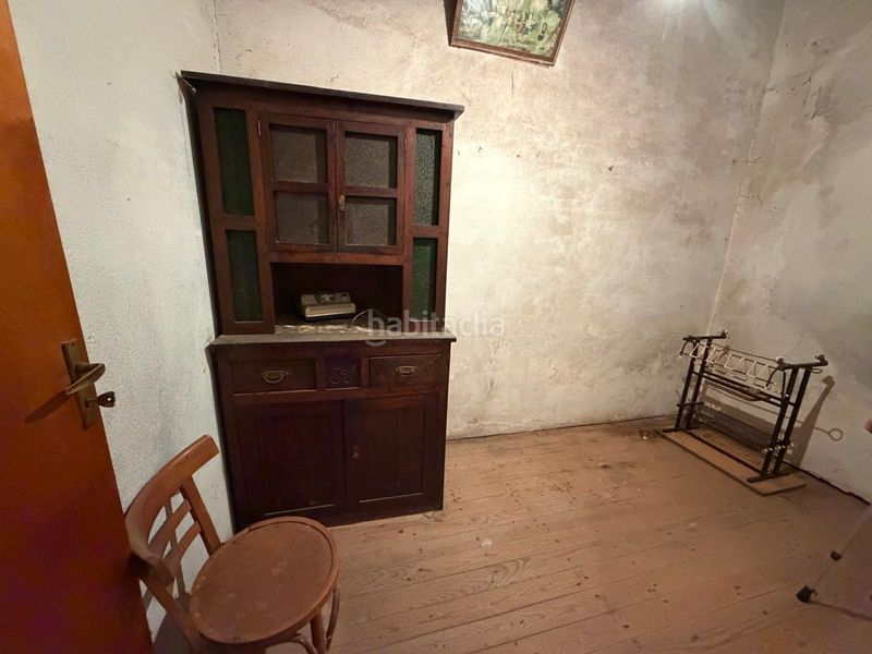 Foto 9aca1e30-968a-4eb8-88f3-c5918192d298. Casa aparellada amb xemeneia a Cartelle