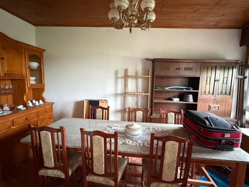 Foto c85c822a-1f04-424a-8261-8f321a0d5e21. Casa aparellada amb xemeneia a Cartelle