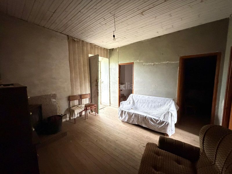 Foto de1cb759-3d0e-4934-9ea5-de14ea93bbbd. Casa aparellada amb xemeneia a Cartelle
