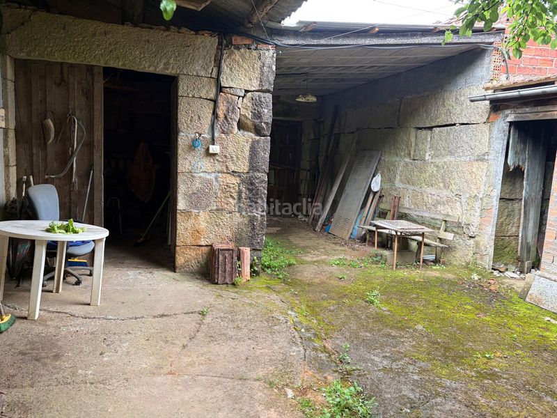 Foto f5291804-1d84-4035-b9cd-195674ff91e2. Casa aparellada amb xemeneia a Cartelle