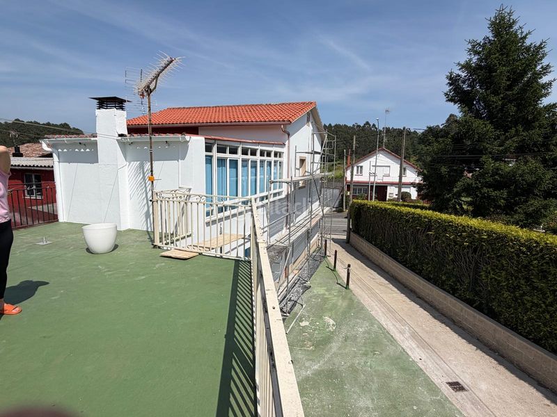 Foto 078696ea-f2b6-48da-ad0c-cb78d30676ea. Casa aparellada amb calefacció aparcament a Boiro