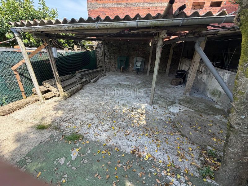 Foto 1f0ca739-b5c9-406f-b3c4-169ec5df762a. Casa aparellada amb calefacció aparcament a Boiro