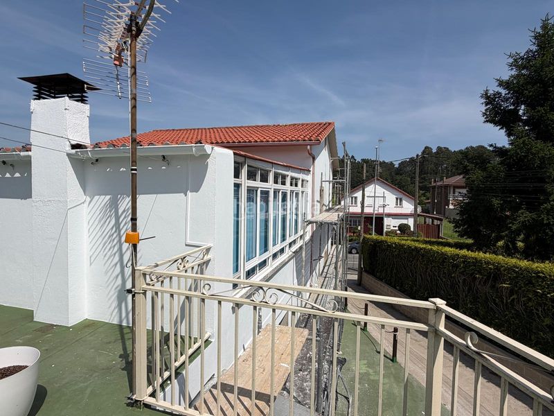 Foto 42520ab8-d65e-4adb-a059-2930b810ed3f. Casa aparellada amb calefacció aparcament a Boiro