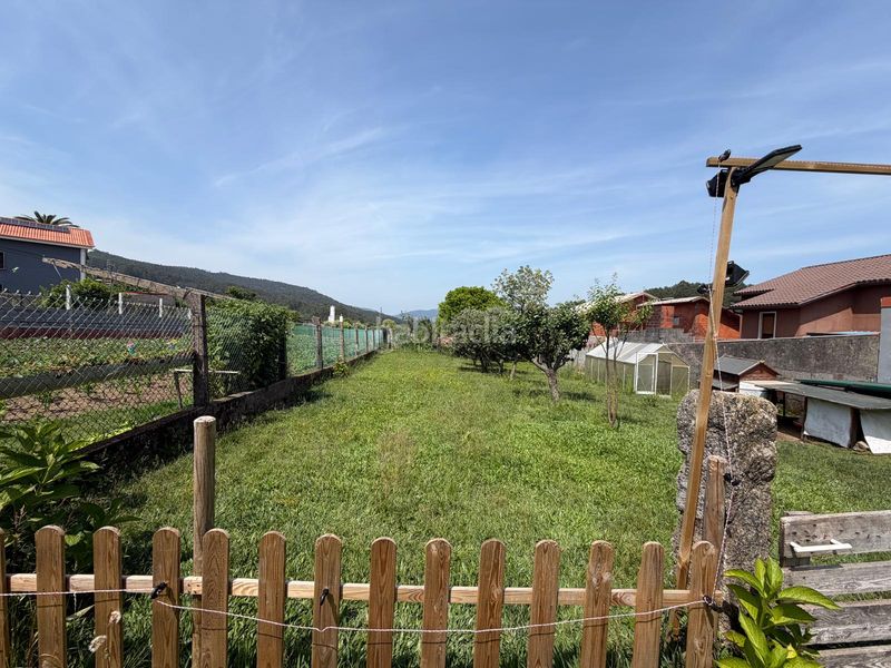 Foto 57c7d3e7-6ba8-4736-bb8c-47826b63059c. Casa aparellada amb calefacció aparcament a Boiro