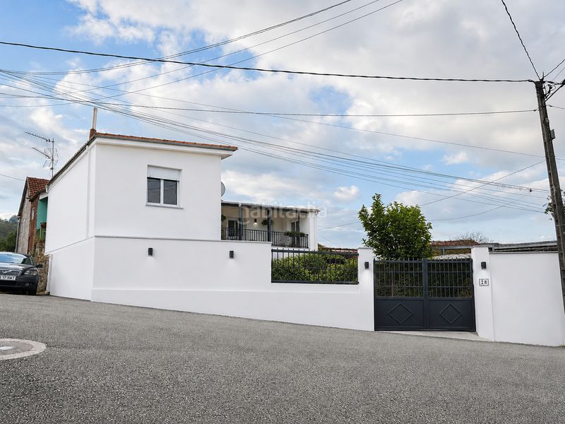 Foto a8d54125-2807-4f72-bc06-61e6dfb6b951. Casa aparellada amb calefacció aparcament a Ponteareas
