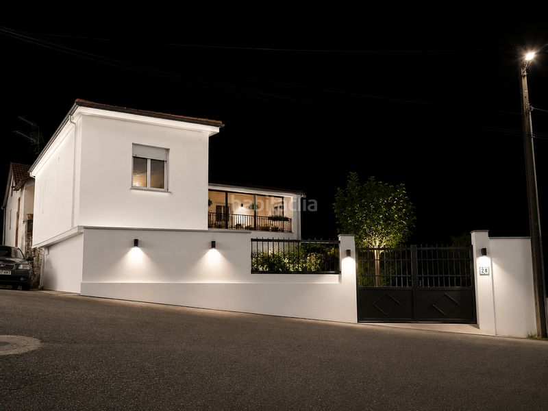 Foto b99e764e-5664-4610-8d57-9b116dbed8b2. Casa aparellada amb calefacció aparcament a Ponteareas