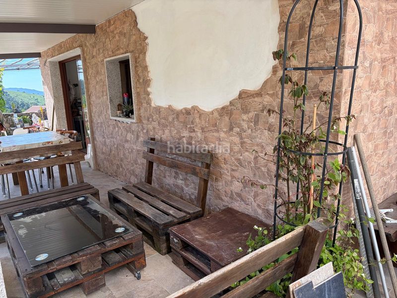 Foto 01b97db3-59f8-4579-95b1-97e0606615ad. Casa aparellada amb calefacció aparcament a Mondariz