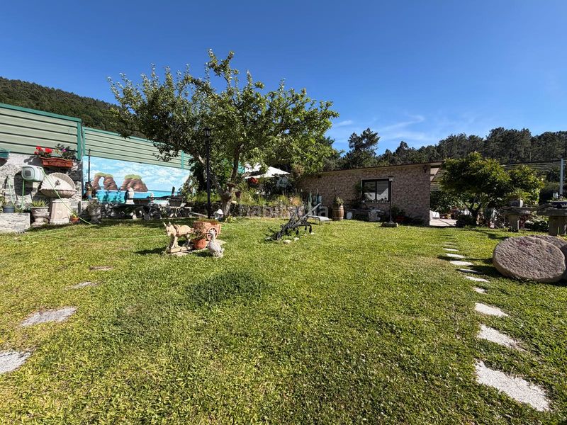Foto 04818295-b063-4515-b9ff-b4a43fe1f1a0. Casa aparellada amb calefacció aparcament a Mondariz