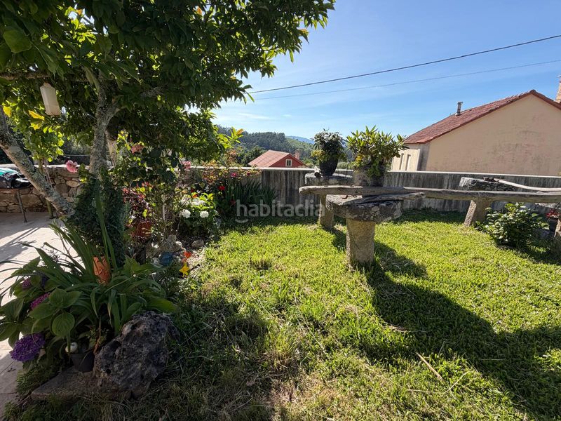 Foto 5a7c3eef-e2a0-48b2-b603-c1cdf37aafd6. Casa aparellada amb calefacció aparcament a Mondariz