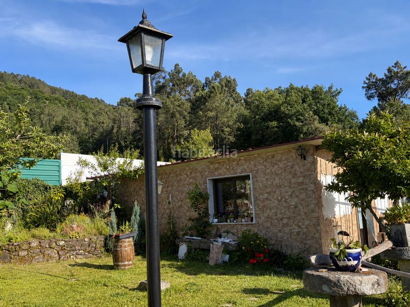 Foto c6c9671e-1239-40c1-8021-77e544e7a0f1. Casa aparellada amb calefacció aparcament a Mondariz