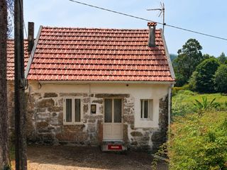 Casa aparellada a Cañiza (A). Acogedora casita con terreno