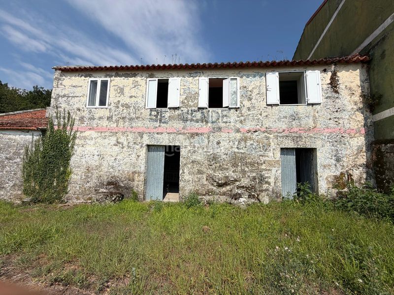 Foto 1df8295a-0366-4e54-873f-501436f2f397. Casa aparellada a Marín